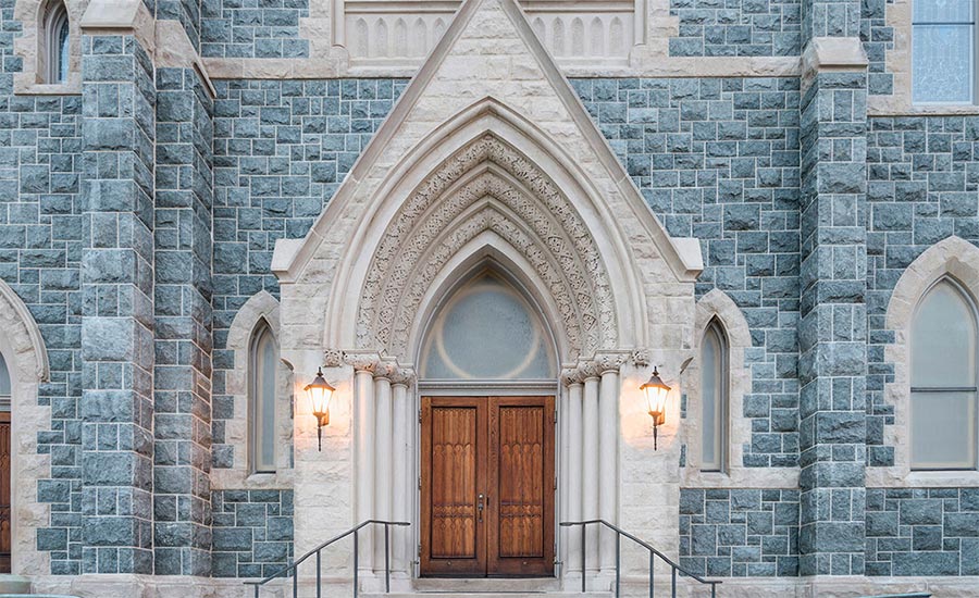 The church that sits high above Augusta Street was covered up and a mystery to all those who passed by for nearly a year.